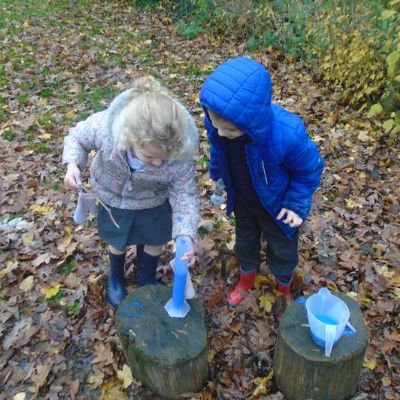 Making mud paint on a rainy day